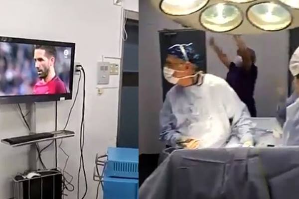 This surgeon obviously knows his priorities and lets his patient wait while he enjoys